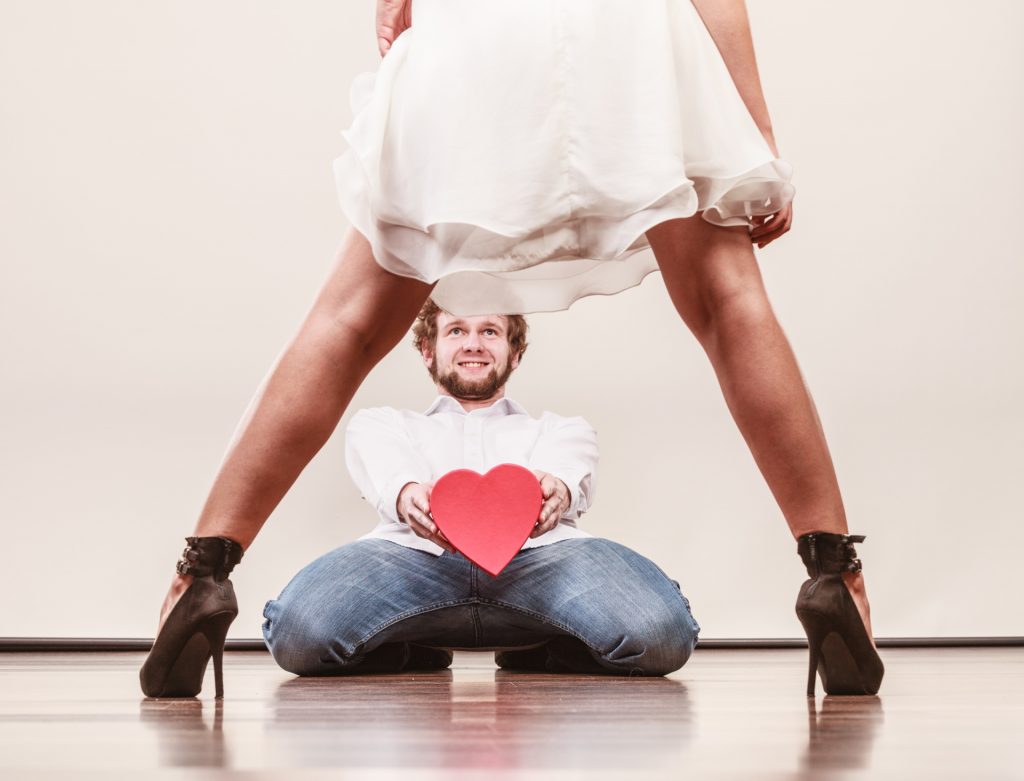 Man gives his heart to woman with legs apart